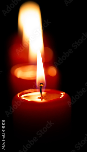Red candles with black background