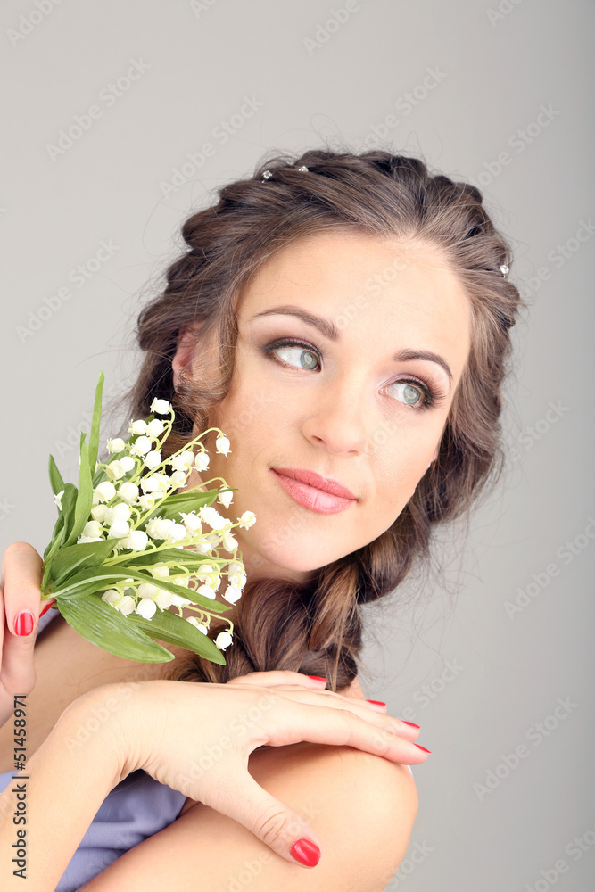 Young woman with beautiful hairstyle and flowers, Young woman with beautiful hairstyle and flowers,