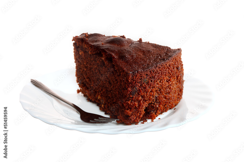 Piece of chocolate cake on white plate Piece of chocolate cake on white plate