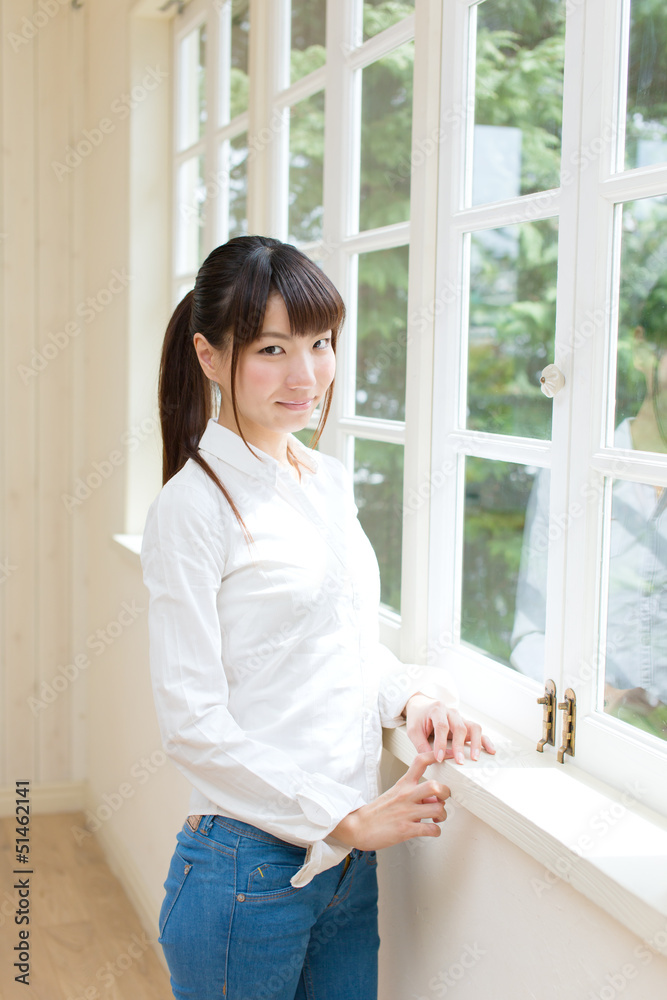 Beautiful young woman relaxing in the room Beautiful young woman relaxing in the room