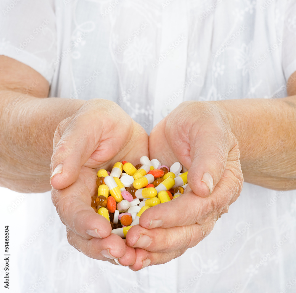 pills in hands of the old man pills in hands of the old man