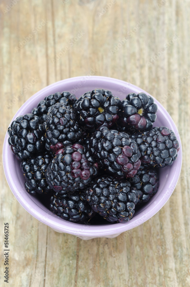 bowl of fresh blackberries close-up top view bowl of fresh blackberries close-up top view