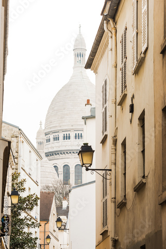 Basilica of the Sacred Heart from one of the Montmartre streets #51468575