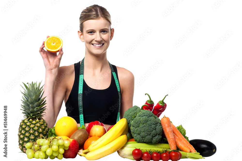 The beautiful girl with fruits and vegetables The beautiful girl with fruits and vegetables