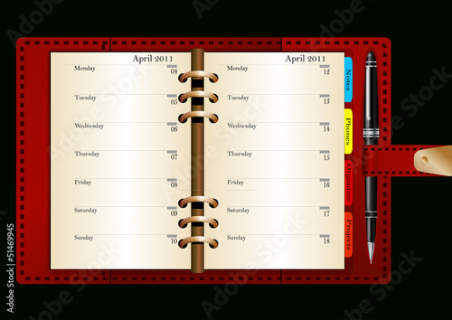 Red organizer with black metallic pen
