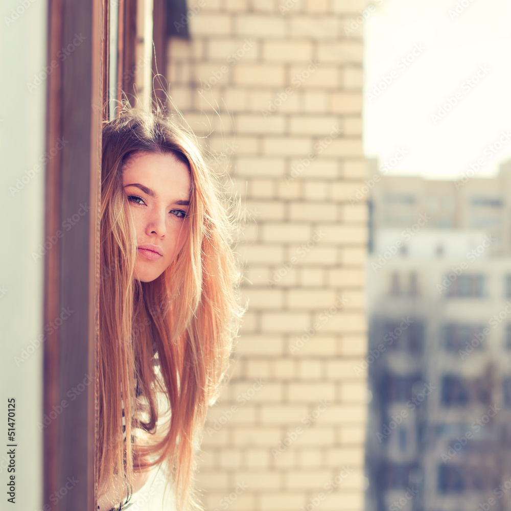 Fototapeta premium beautiful young woman enjoying the freshness