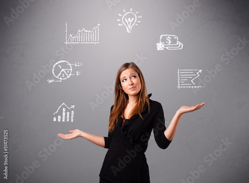 beautiful young woman juggling with statistics and graphs photo