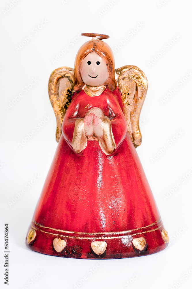 Angel figurine praying and smiling