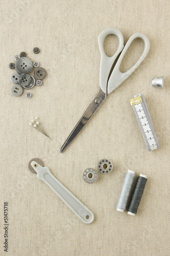 Sewing accessories in grey tones