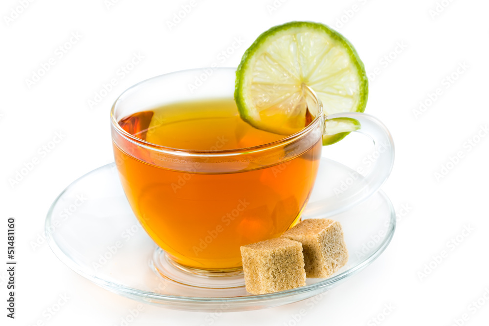 Tea in a glass cup with lime