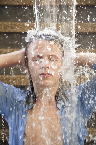 Portrait of a young man in the water