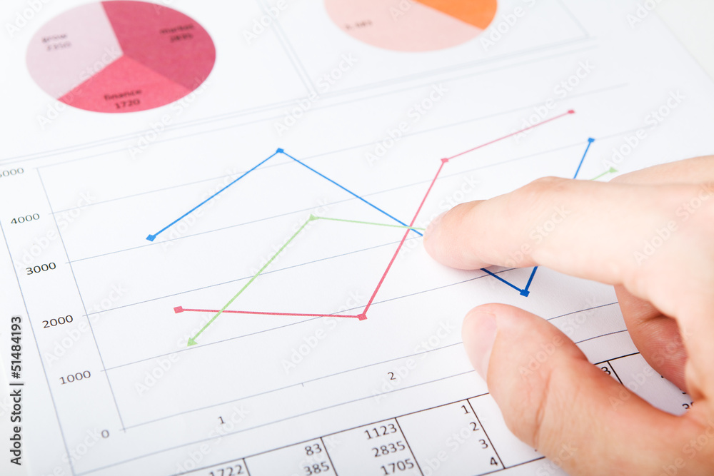 Finger showing point of intersection on the graph Finger showing point of intersection on the graph