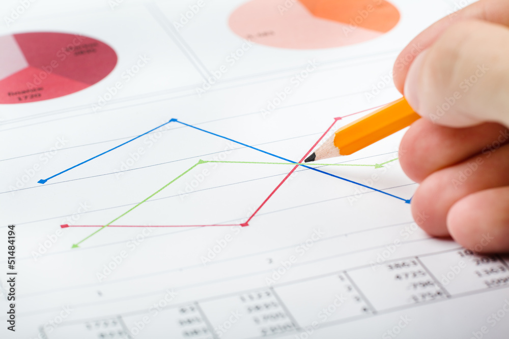 Pencil pointing on the chart Pencil pointing on the chart