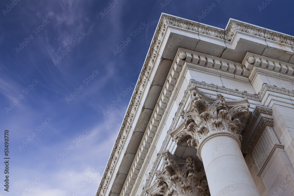 Fototapeta premium Court House Architectural Detail with Blue sky and clouds.