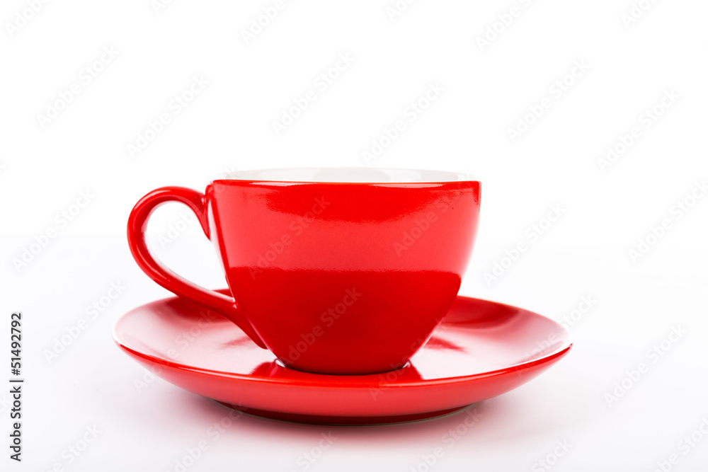 A red cup of coffee isolated on white background A red cup of coffee isolated on white background