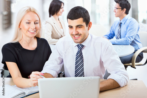Business people working at meeting