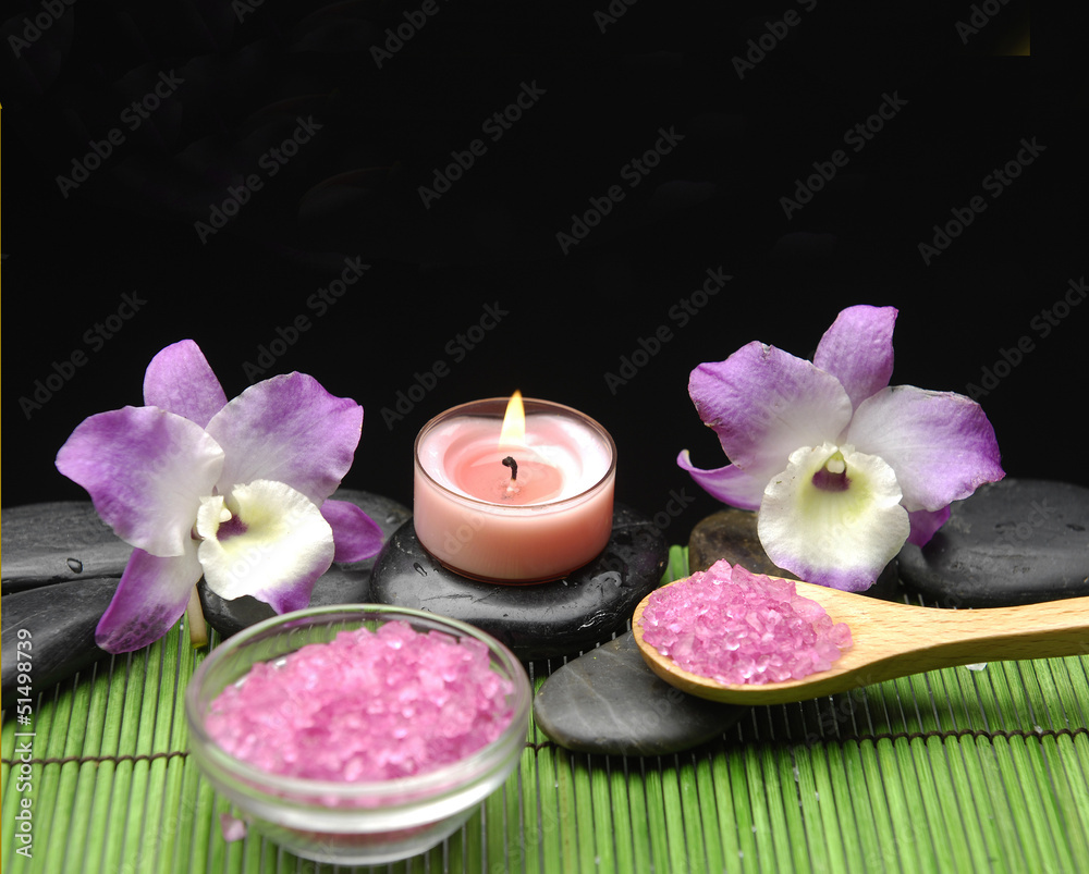 orchid with salt in bowl and candle ,grove on green mat orchid with salt in bowl and candle ,grove on green mat