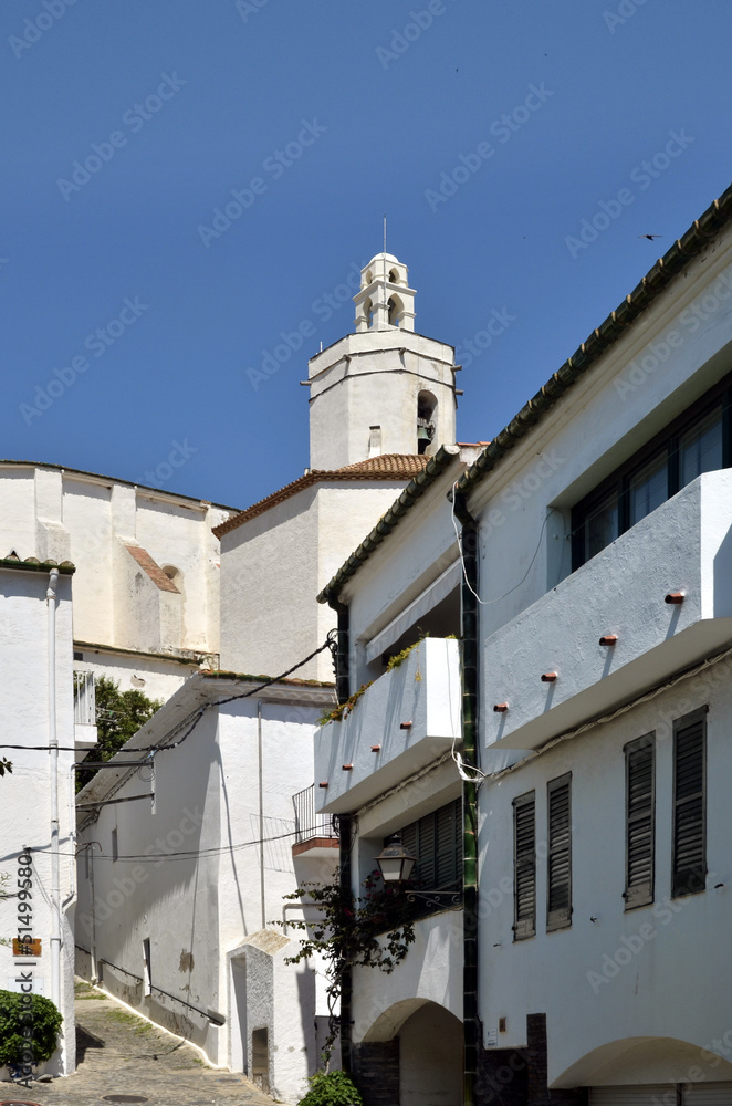 Alley and church of Cadaqués in Spain
