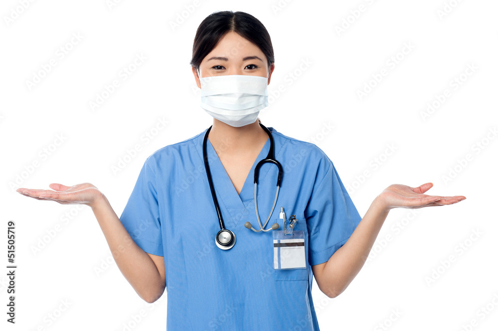 Female physician posing with open palms