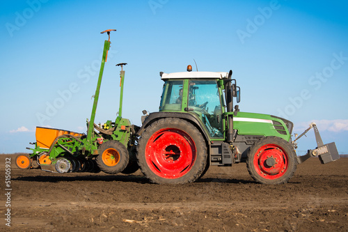 Tractor in the field sow