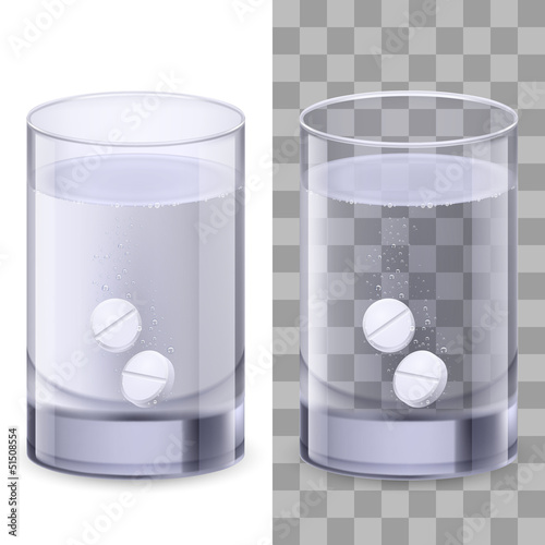 Glass of water and pills