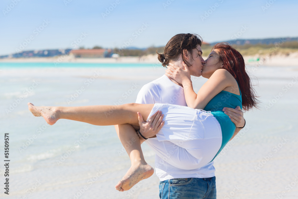 Young Couple in a Caribbean Beach Young Couple in a Caribbean Beach