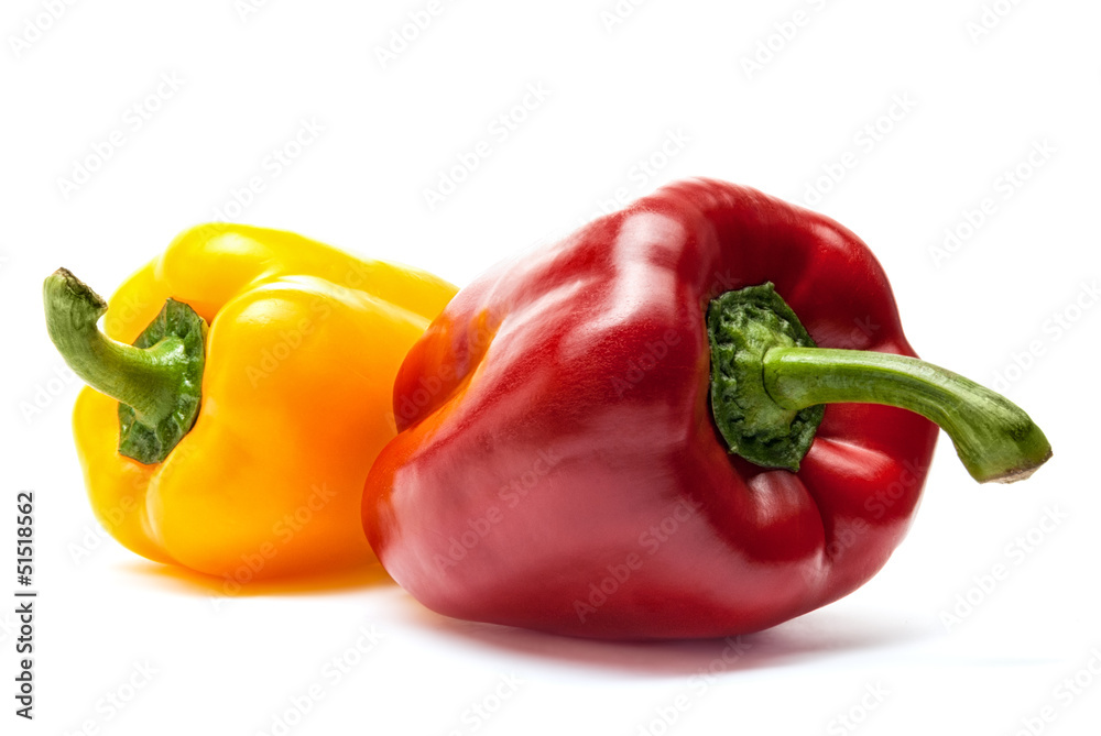 Red and Yellow Bell Peppers on a White Background Red and Yellow Bell Peppers on a White Background