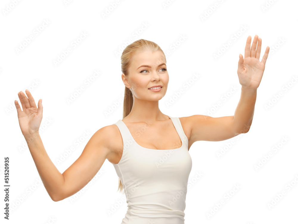 woman in white t-shirt pressing imaginary button woman in white t-shirt pressing imaginary button