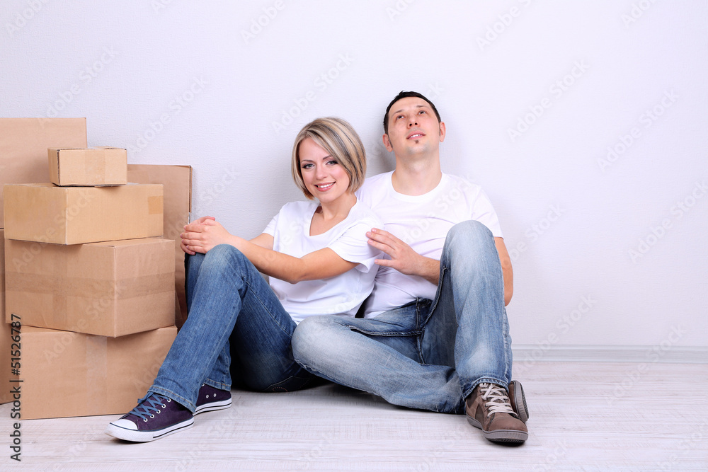 Young couple moving in new house Young couple moving in new house