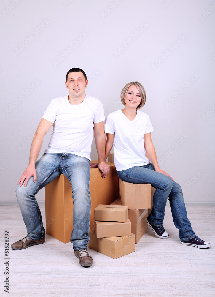 Young couple moving in new house Young couple moving in new house