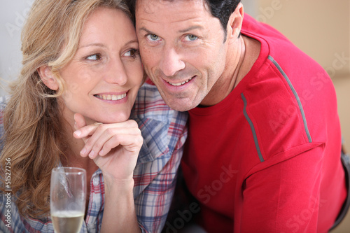 Blond woman holding champagne