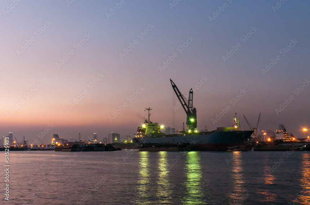 Industrial shipping port in the twilight in Bangkok, Thailand