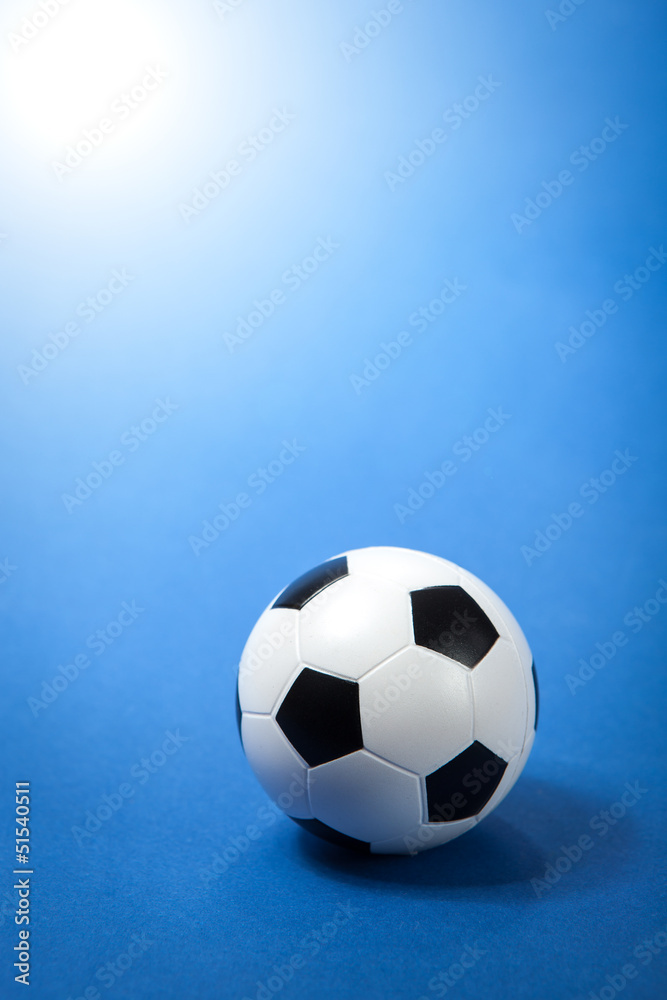 Soccer ball on blue