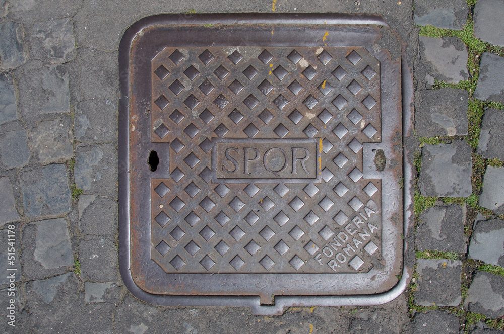 Fototapeta premium SPQR, typical manhole cover in Rome, Italy