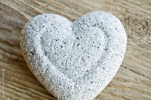 stone heart on wood