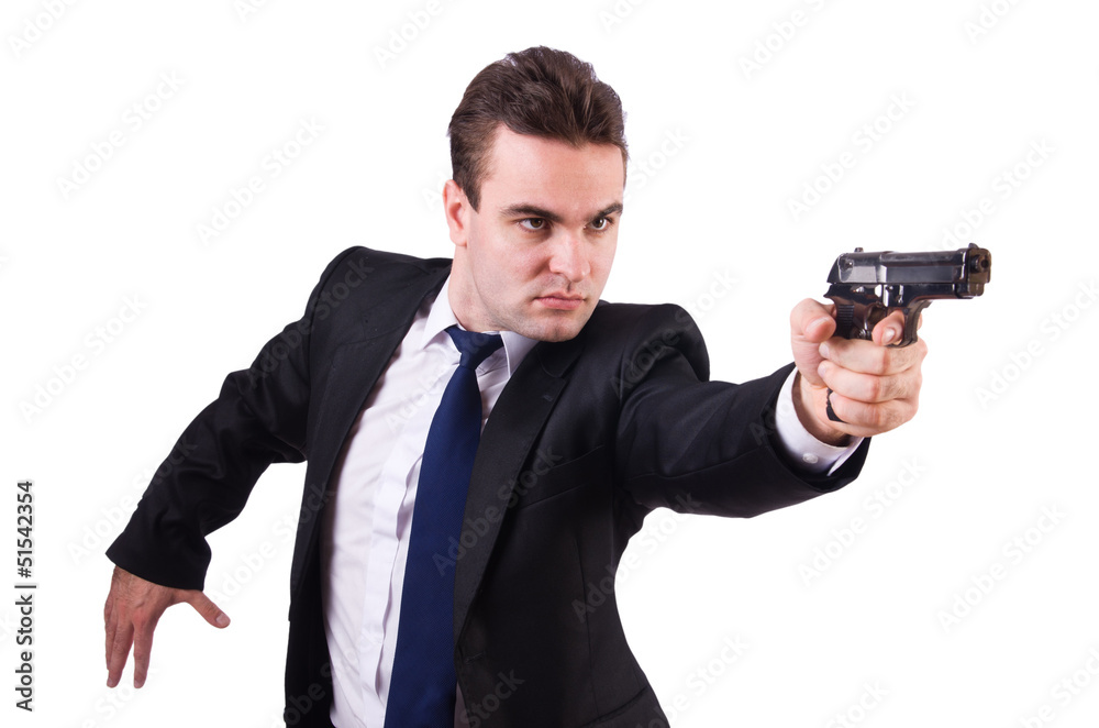 Businessman with gun isolated on white Businessman with gun isolated on white