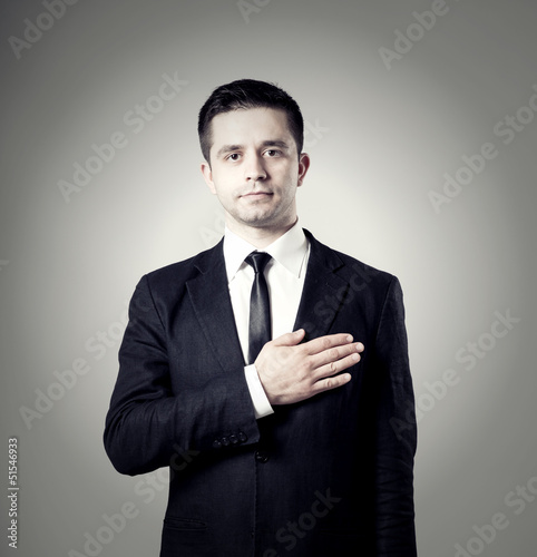 young male entrepreneur pointing at something interesting