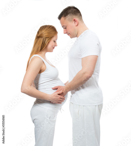 man touching belly of his pregnant woman