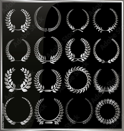 Set from silver laurel wreath on the black background