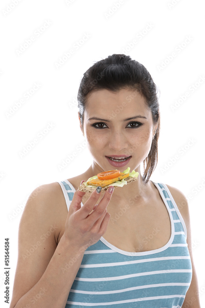 Model Released. Woman Eating Cheese and Cracker Model Released. Woman Eating Cheese and Cracker