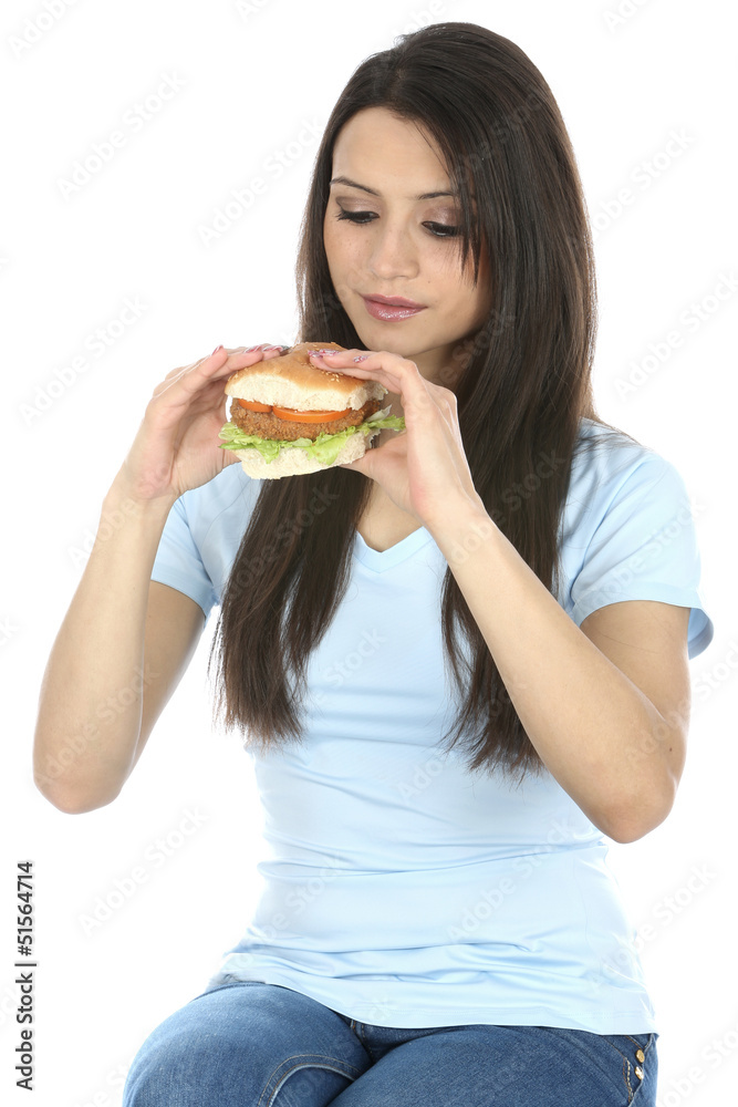 Model Released. Woman Eating Beanburger