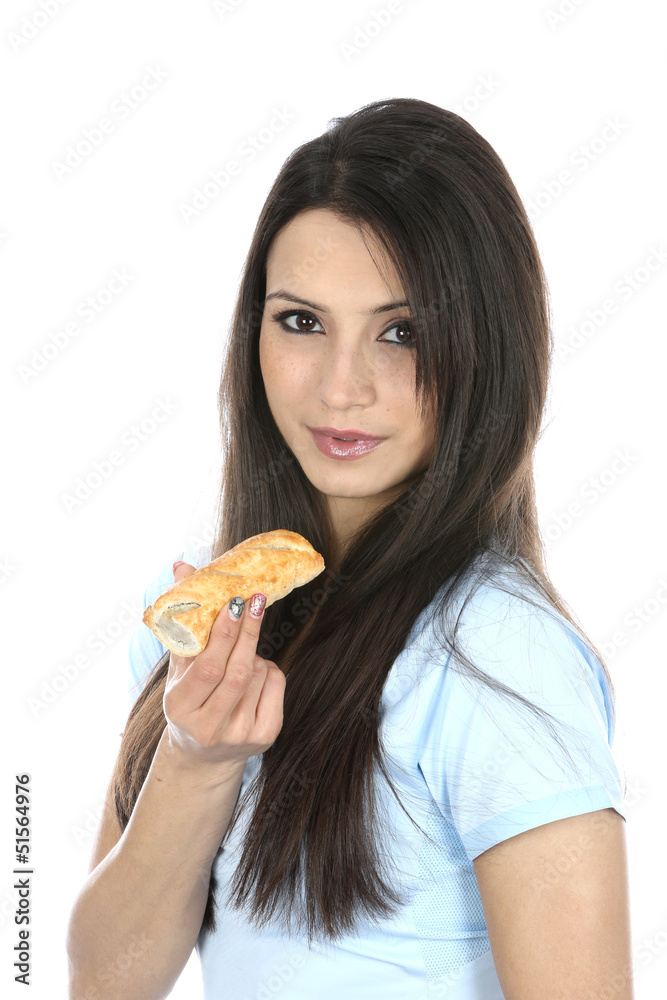 Model Released. Woman Eating Sausage Roll