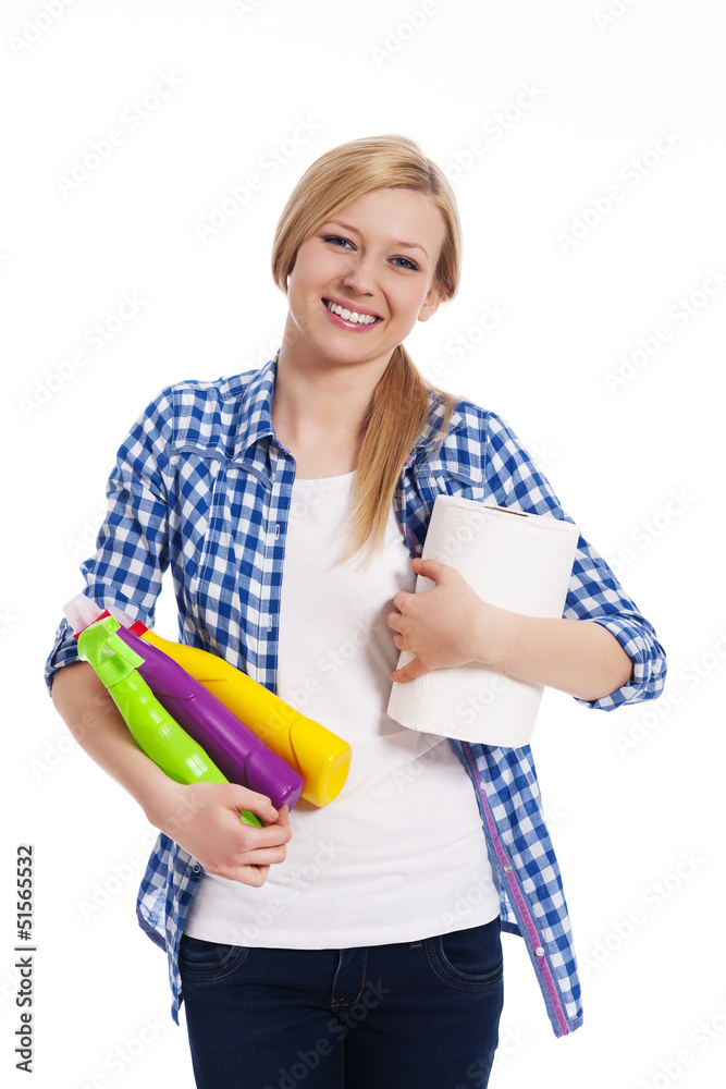 Happy blonde woman holding cleaning equipment Happy blonde woman holding cleaning equipment