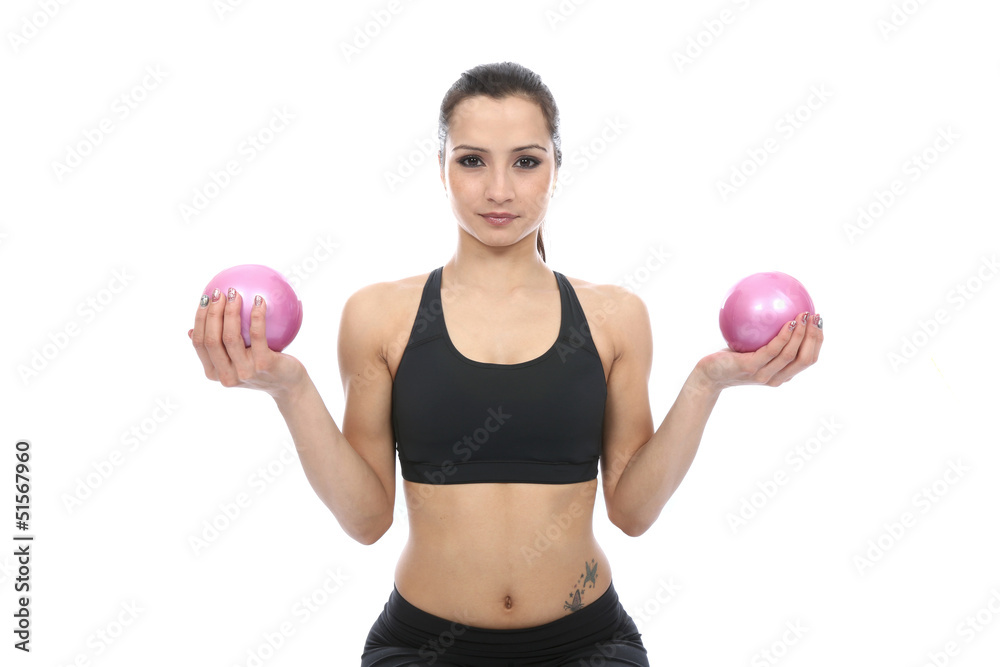 Model Released. Woman Exercising with Toning Balls Model Released. Woman Exercising with Toning Balls