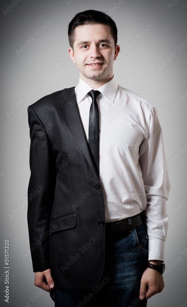 Fototapeta premium Handsome young businessman wearing suit