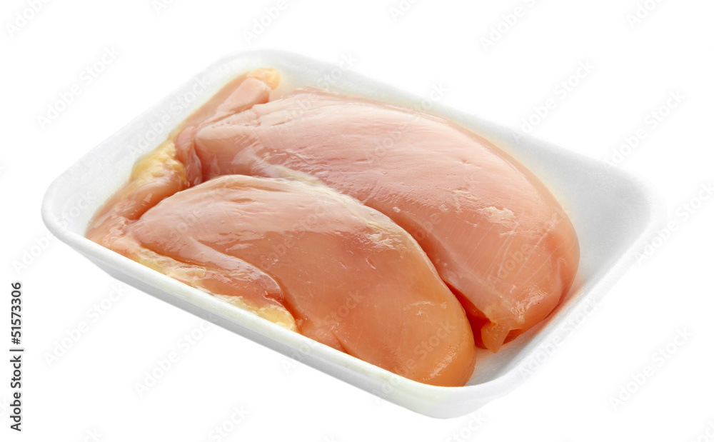 raw chicken meat in plastic tray isolated on white