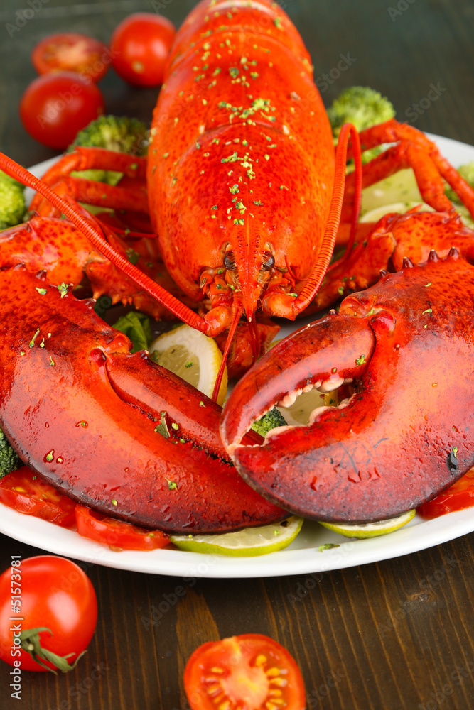 Red lobster on platter on table close-up Red lobster on platter on table close-up