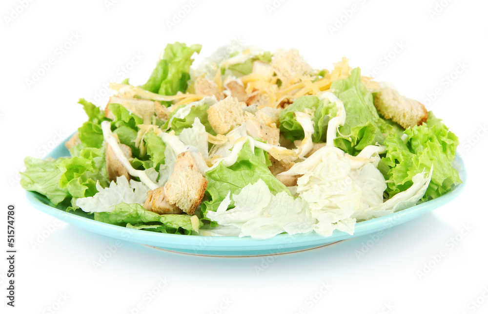 Caesar salad on blue plate, isolated on white Caesar salad on blue plate, isolated on white