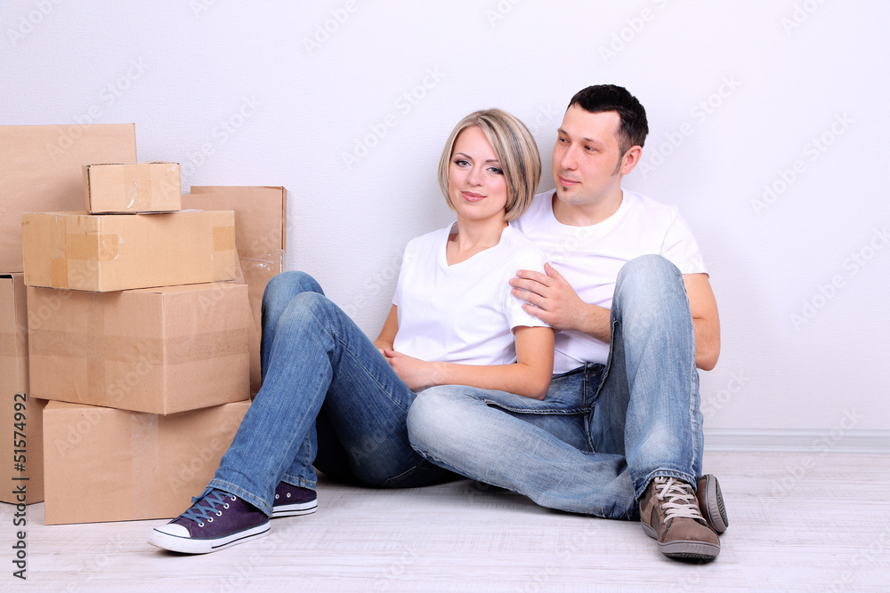 Young couple moving in new house Young couple moving in new house