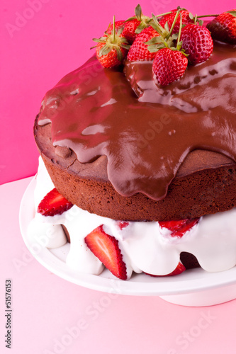 chocolate cake with cream and strawberry